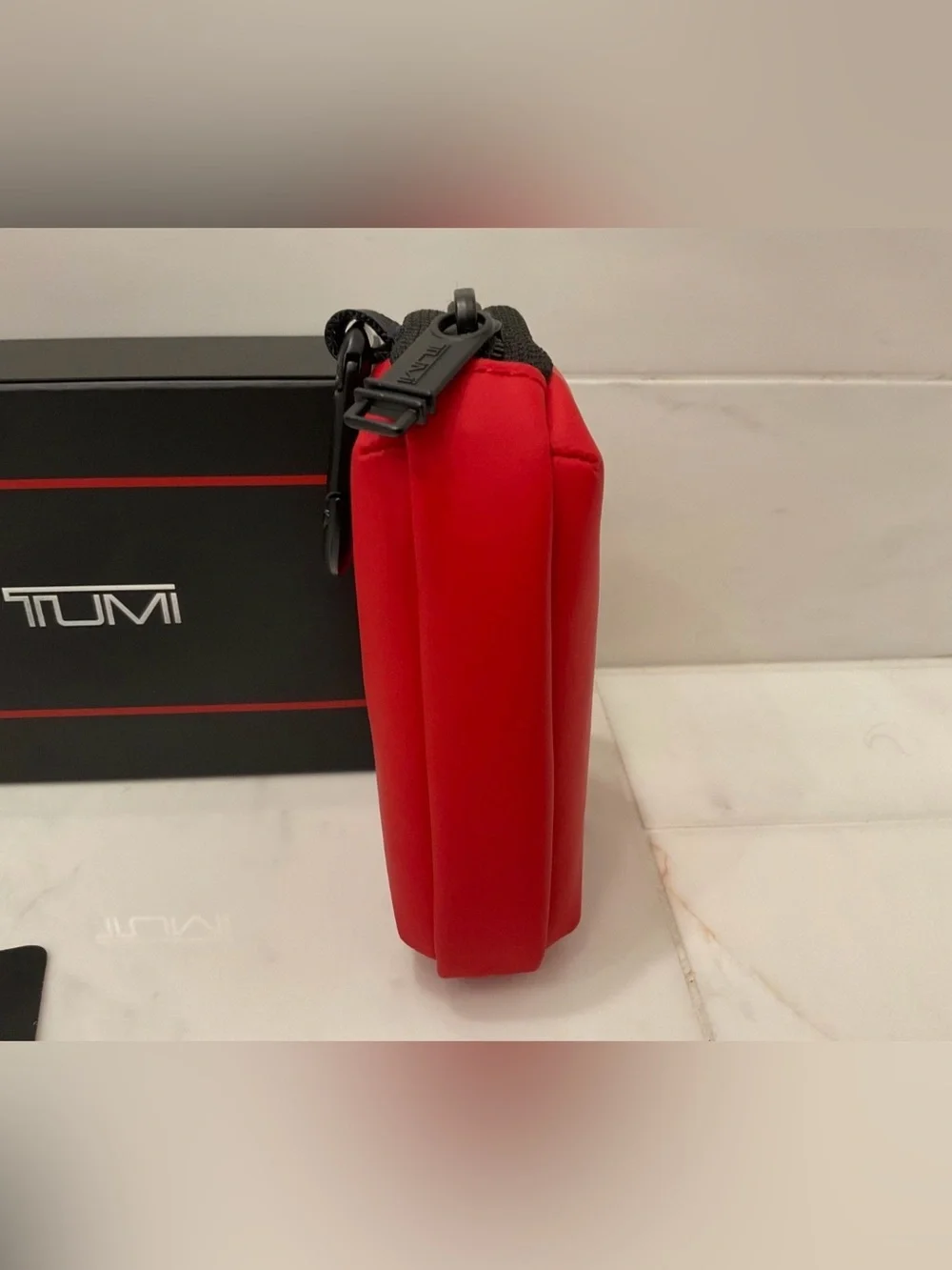 Tumi up sale